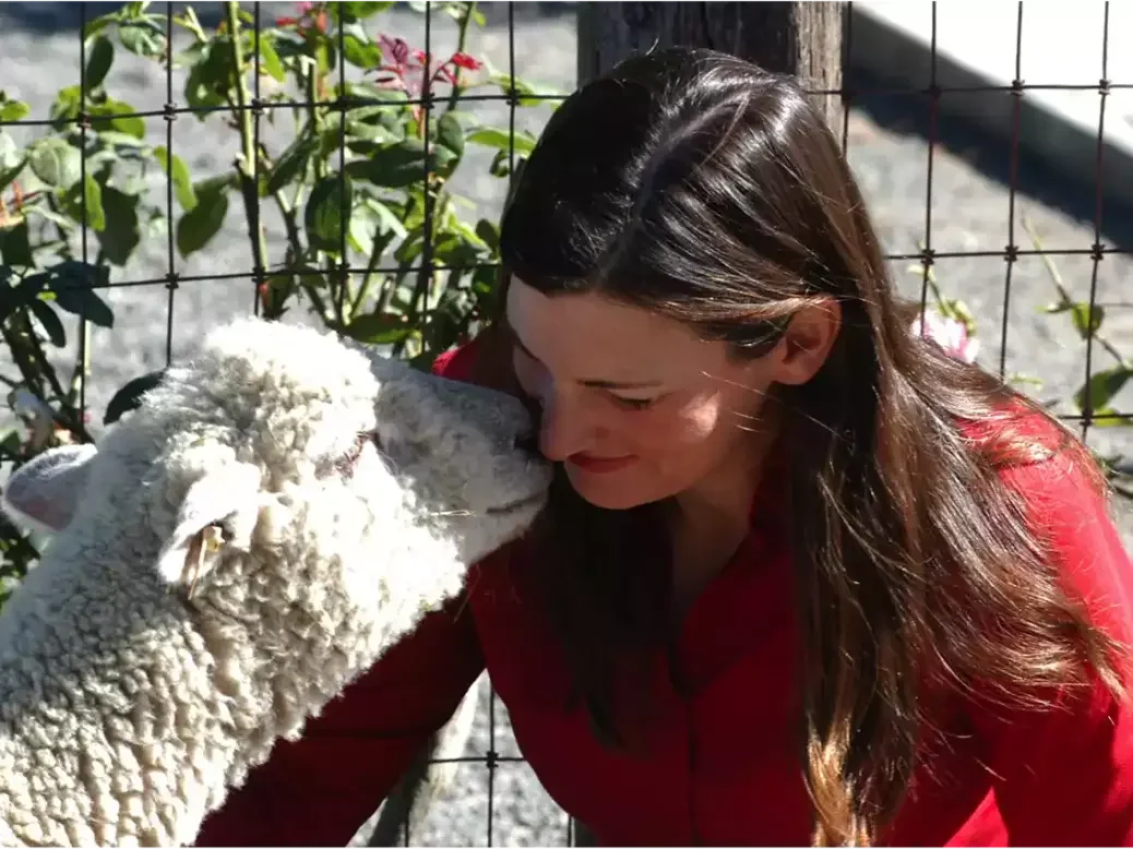 Virginia Lambrix with one of her more surprising allies in the vineyard.